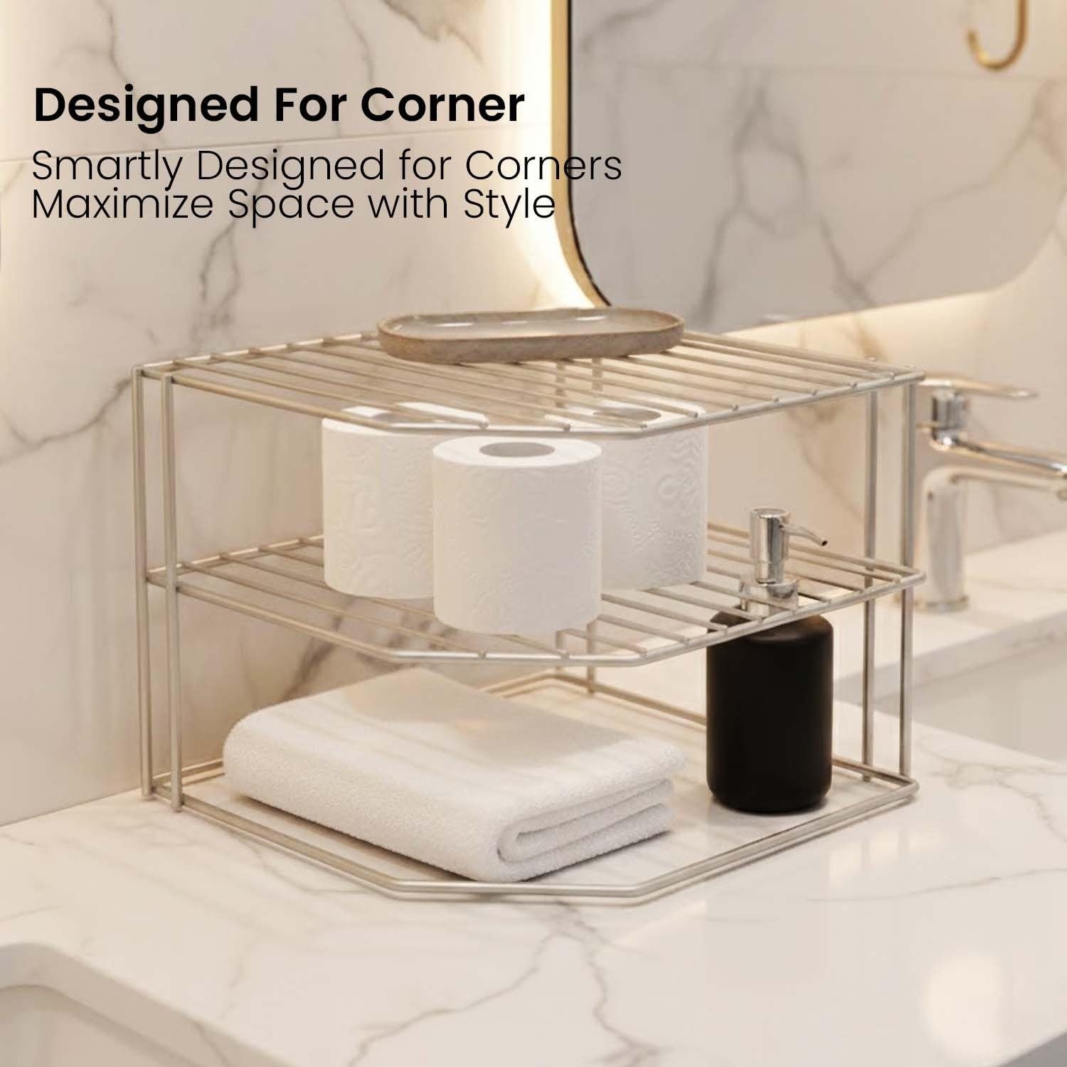 Go Hooked white metal 3-tier corner shelf organizer holding toilet paper, soap dispenser, and folded towel on a marble countertop.