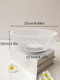 GoHooked white metal mesh fruit bowl with dimensions shown on a white surface with decorative flowers.