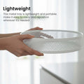 Go Hooked white metal revolving fruit basket with perforated sides and a lazy susan base.