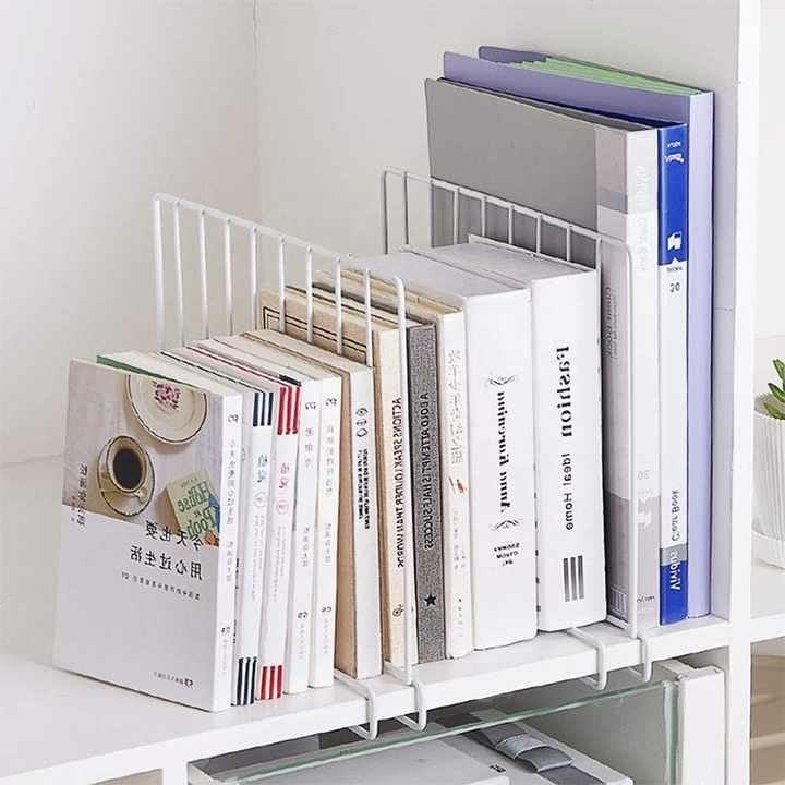 GoHooked white metal wardrobe shelf divider, set of 2, organizing books and binders on a shelf.
