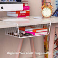 GoHooked white metal under shelf basket with wire rack design, holding books and accessories under a desk.