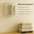 GoHooked white heavy duty iron wall mounted book shelf with a Vogue Home Book on it. Stack of books below.