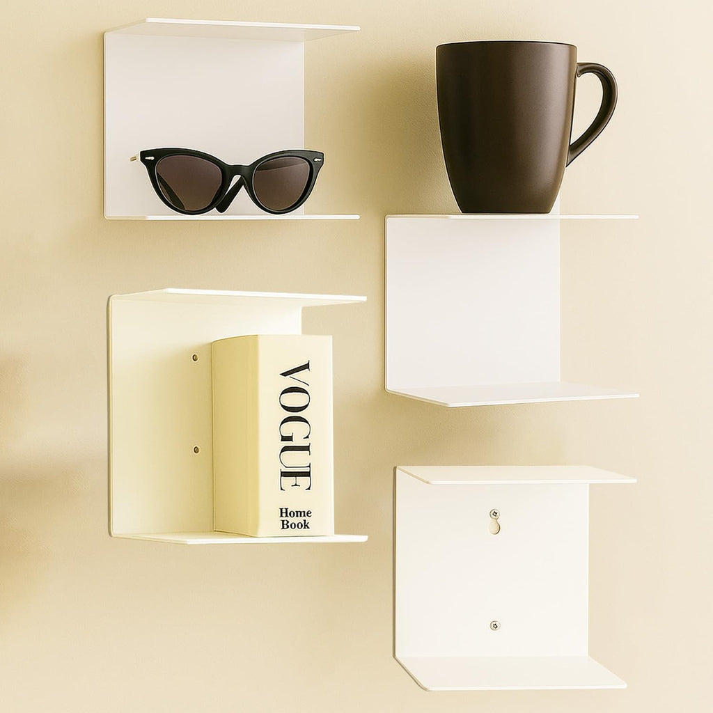 GoHooked white metal wall shelves, set of 3, displaying sunglasses, a book, and a mug. Ideal for study rooms or living rooms.