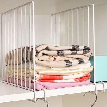 GoHooked white metal wardrobe shelf dividers organizing folded blankets and linens on a shelf.