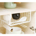 Go Hooked white metal wire under shelf basket, 12 inch, for kitchen cabinet storage. Holds bowls, spoons, and rolls.