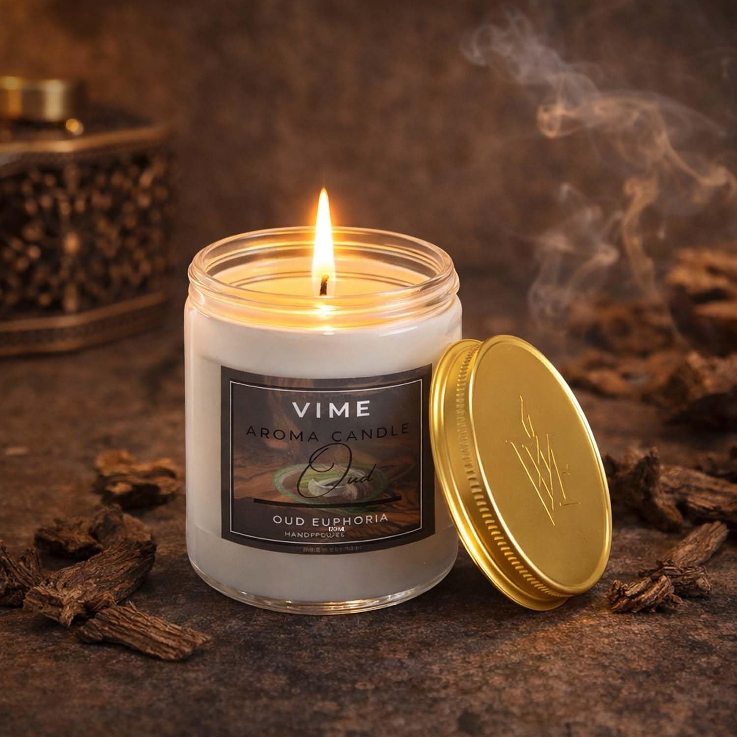 GoHooked white wax aroma candle in a glass jar with a gold lid, Oud Euphoria scent, 120ml.