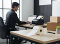 GoHooked white paper barcode labels on a roll, ideal for warehouse and shipping applications.
