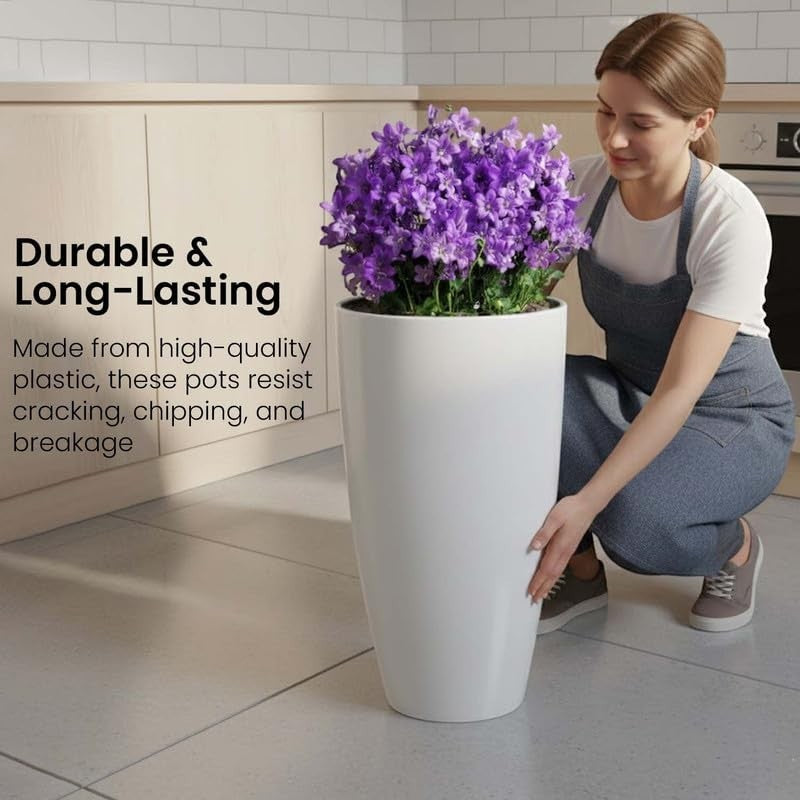 Go Hooked tall white plastic flower pot, 14 inch, with purple flowers. Woman in apron placing pot.