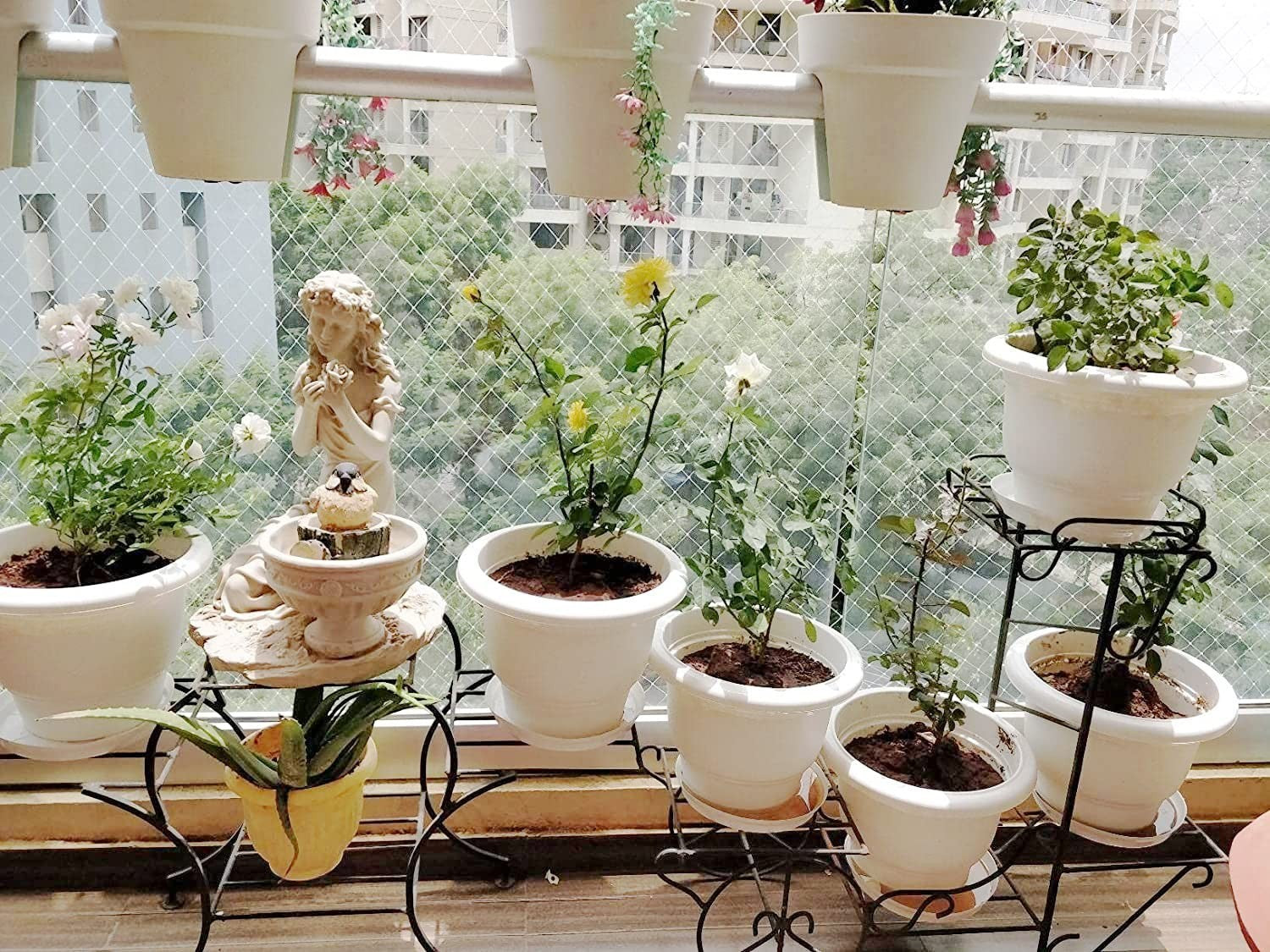 GoHooked white plastic 10-inch flower pots with matching bottom trays, ideal for indoor/outdoor plants.
