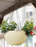 Go Hooked white plastic hanging flower pot with woven texture and metal chain. Ideal for patios and gardens.