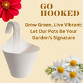 Go Hooked white plastic hanging planter with a curved handle, ideal for vertical gardens and balconies.