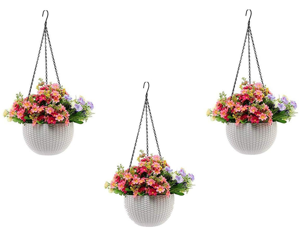 Go Hooked white plastic hanging pot with woven texture, filled with pink and purple flowers.