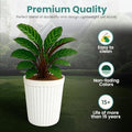 Go Hooked white 14-inch ribbed plastic planter pot with a green plant. Durable, lightweight, and weather-resistant.