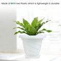 GoHooked white plastic planter pot with saucer, featuring a modern twister design, perfect for indoor or outdoor plants.