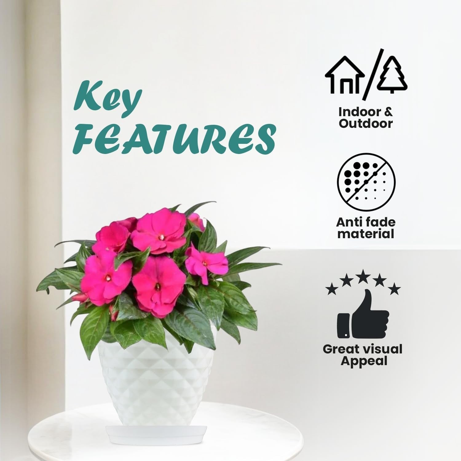 Go Hooked white diamond-patterned plastic planter pot with pink flowers and saucer tray. Indoor/outdoor, anti-fade material.