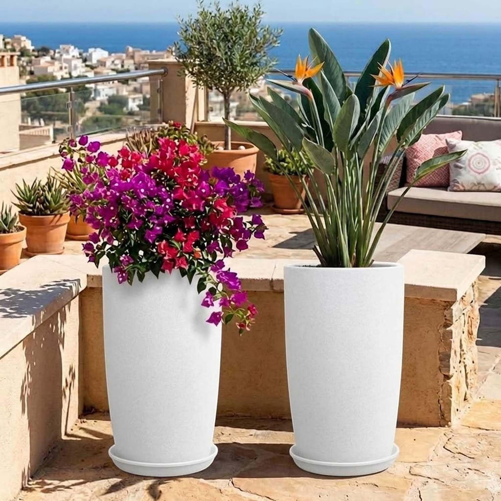 GoHooked white cylindrical plastic planters with saucers, perfect for indoor or outdoor use.