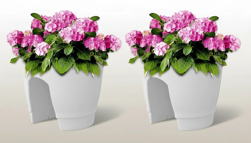 GoHooked white plastic railing planters (12 inch, set of 2) with pink hydrangeas and green leaves.