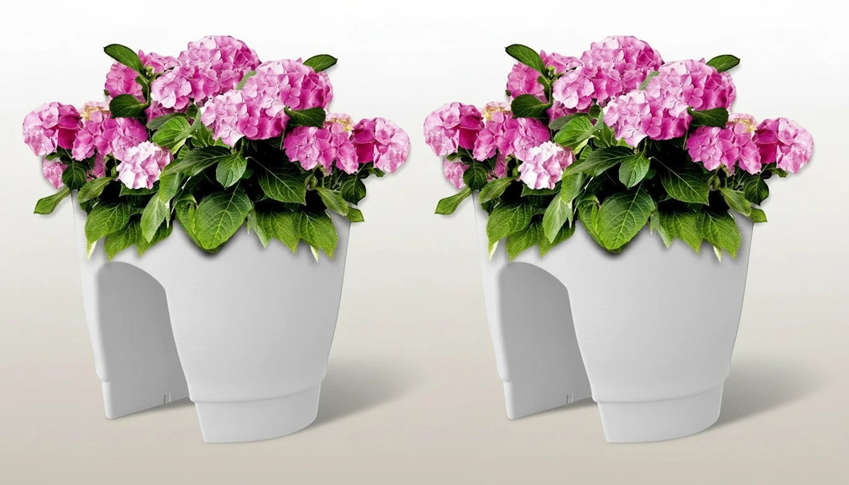 GoHooked white plastic railing planters (12 inch, set of 2) with pink hydrangeas and green leaves.