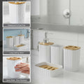 Go Hooked white plastic ribbed bathroom accessory set with soap dispenser, tumbler, toothbrush holder, and soap dish.