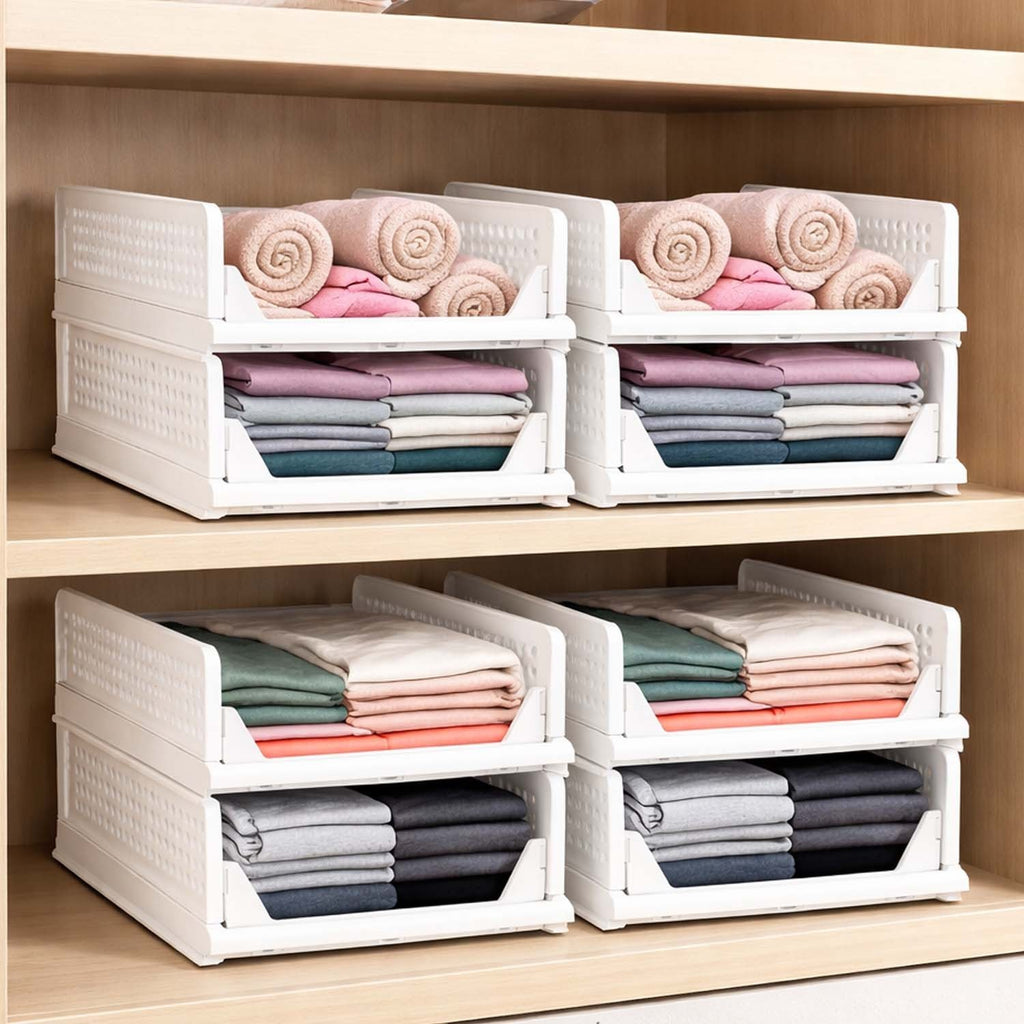 GoHooked white foldable plastic wardrobe organizers stacked on wooden shelves for neat clothing storage