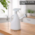 GoHooked white 1-litre plastic watering can with adjustable spray nozzle for indoor plants and gardens.