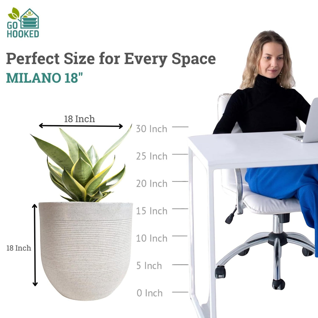 Go Hooked 18-inch white ribbed polymer planter with a snake plant, perfect for indoor or outdoor use.