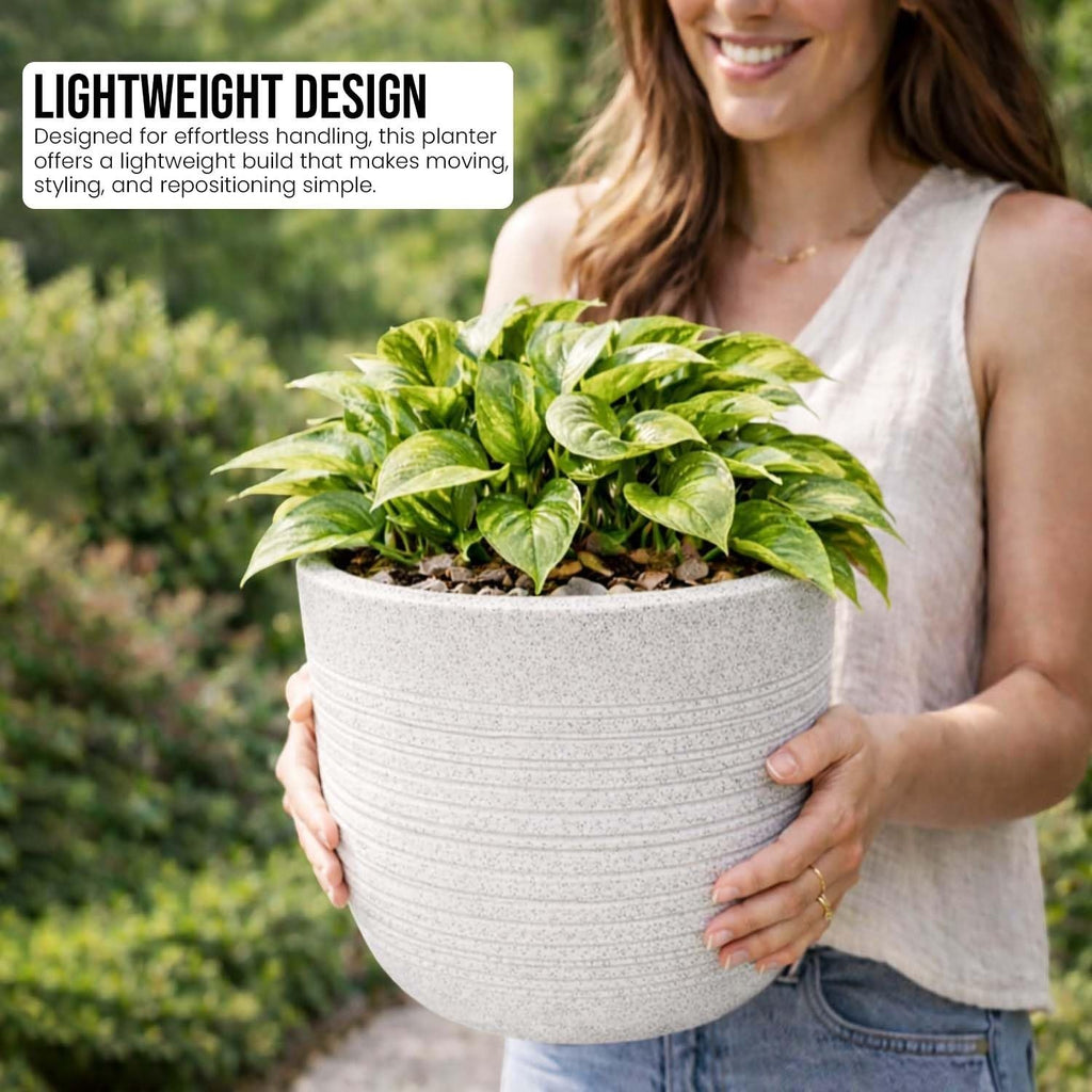 GoHooked 10 inch white polymer planter pot with textured ribbed design and matching tray, held by a woman outdoors.
