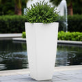 GoHooked white polymer square planter with a textured finish, holding a green shrub. Ideal for modern indoor or outdoor decor.