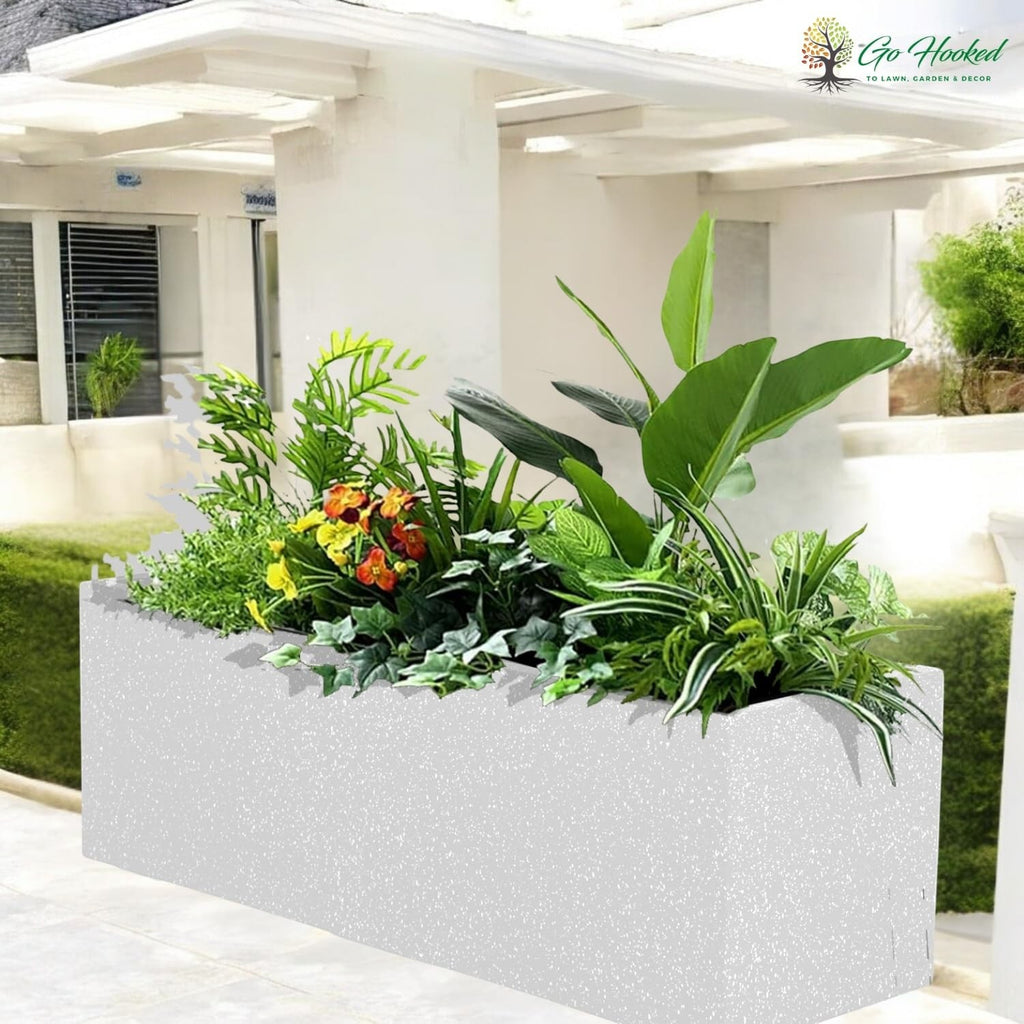 GoHooked white rectangular polymer planter pot filled with lush green plants and colorful flowers, perfect for outdoor or indoor use.