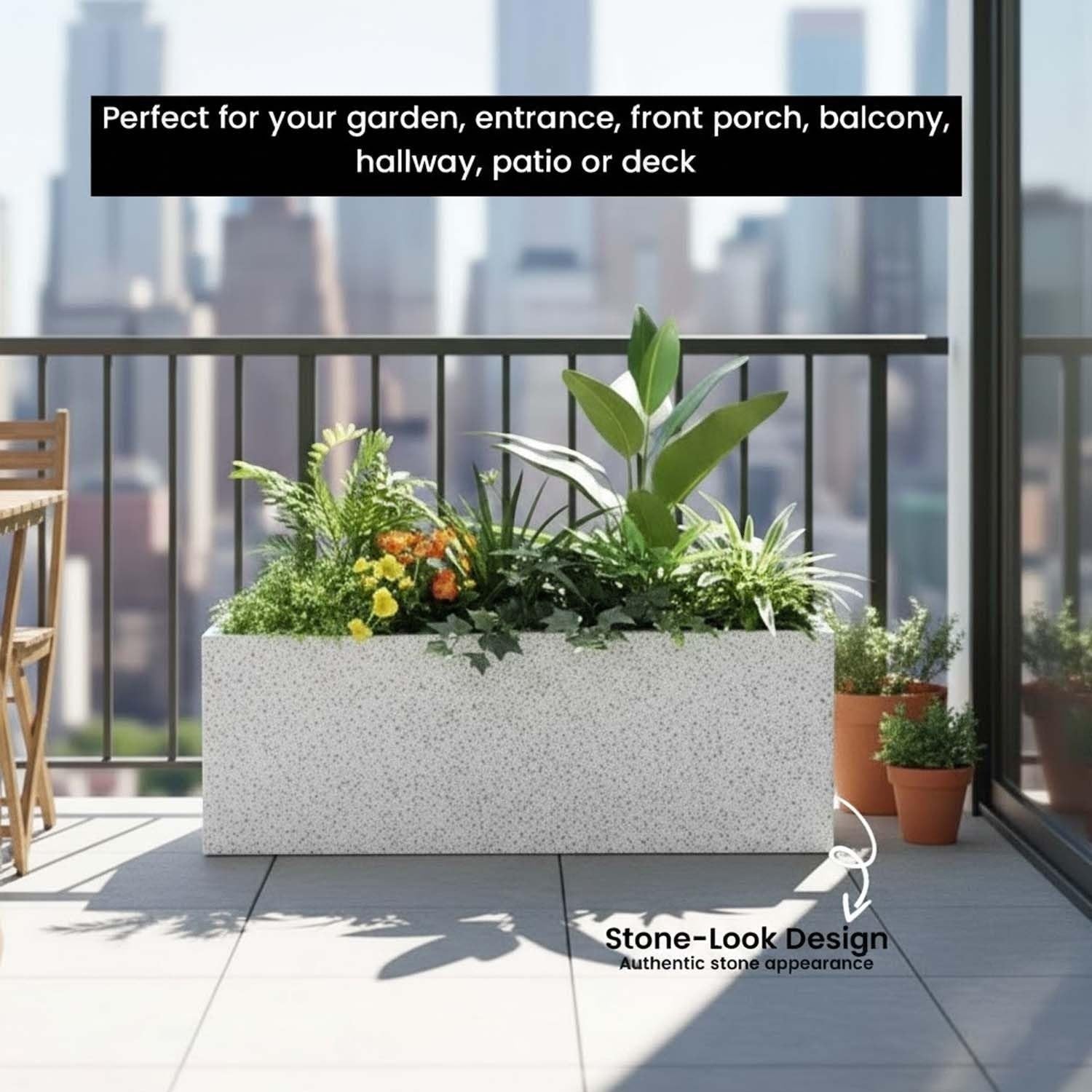 GoHooked rectangular white polymer planter with a stone-look finish, placed on a balcony with lush green plants.