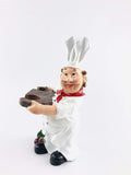 Go Hooked white resin chef figurine holding a platter, eco-friendly wine holder.