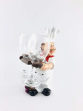 Go Hooked white resin chef wine glass holder with red scarf and grapes at base. Holds two glasses.