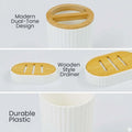 Go Hooked white plastic bathroom accessories set with ribbed design and wooden style drainers. Includes soap dispenser, toothbrush holder, tumbler, and soap dish.