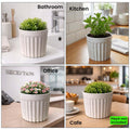 GoHooked white ribbed plastic flower pot with marble finish, 4-inch size, perfect for indoor plants.