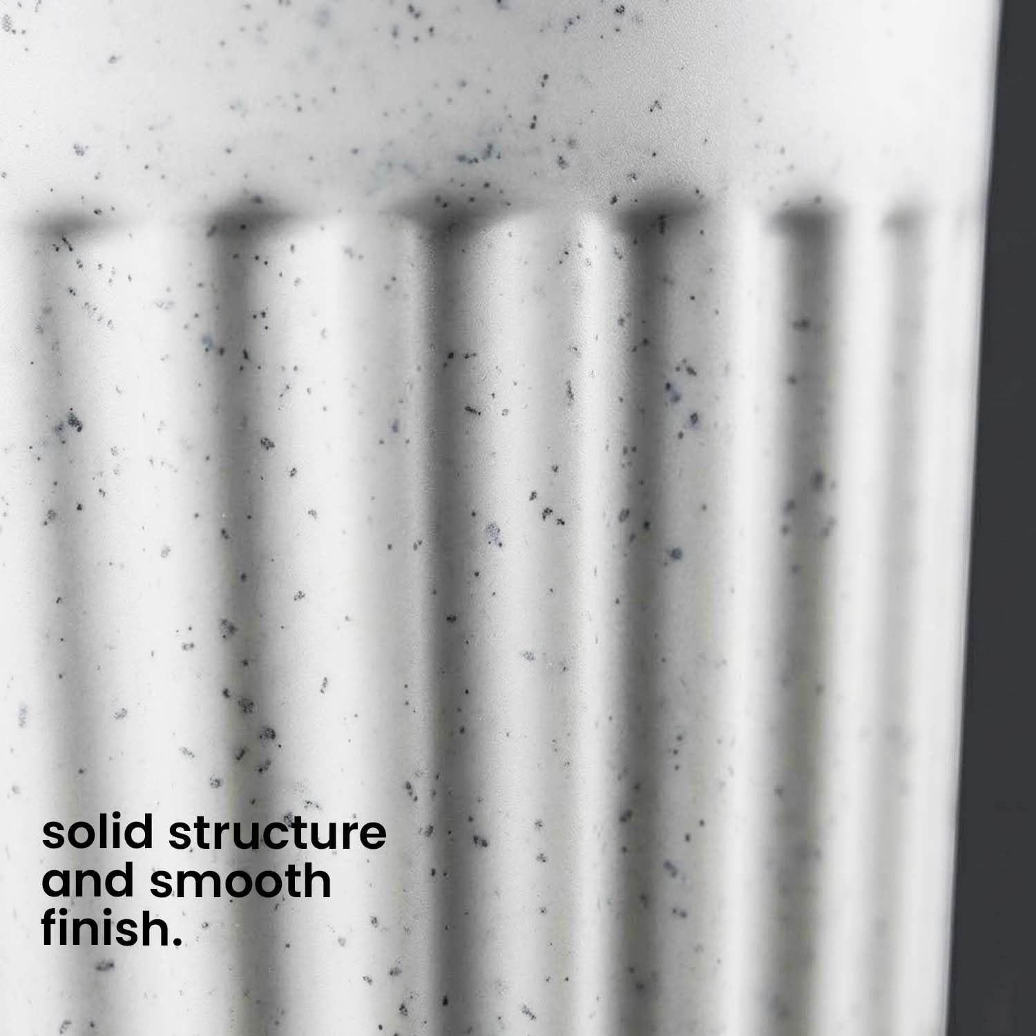 GoHooked white plastic indoor plant pot with ribbed texture and speckled marble finish.