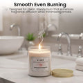 GoHooked white rose incense aroma candle in a glass jar with a gold lid, burning smoothly.