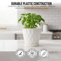 Go Hooked white speckled plastic planter with a diamond pattern and matching saucer on a white countertop.