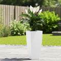GoHooked white square polymer planter with a peace lily plant on a paved patio.