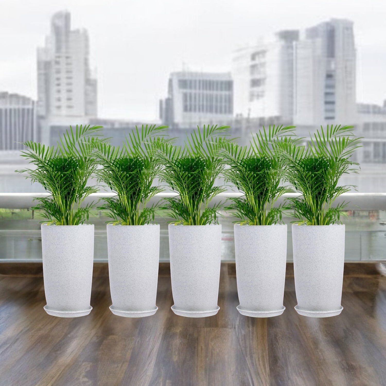 GoHooked pack of five white 18-inch tower planters with saucer trays, displayed on a balcony with green plants.