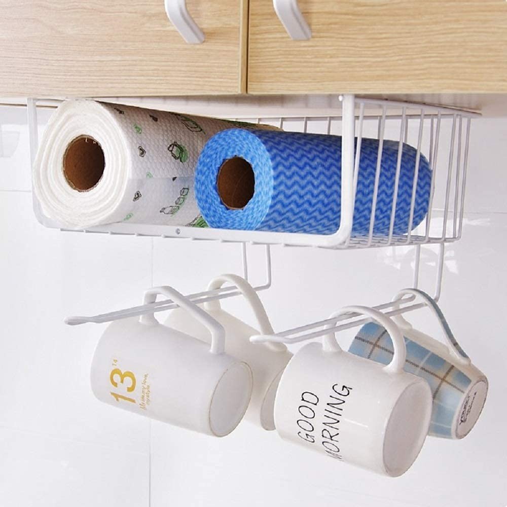 GoHooked white wire under cabinet storage basket holding paper towels and mugs. Features a durable powder-coated iron construction.