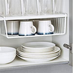GoHooked white wire under shelf basket for cabinet storage, made of durable powder-coated iron. Holds mugs, bowls, and plates.
