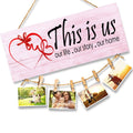 GoHooked white MDF wood wall sign with "This is Us" quote and clips for photos. Rustic farmhouse decor.