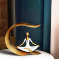 GoHooked white polyresin meditating yoga lady statue with gold accents, seated in lotus pose.