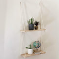 GoHooked natural wood two-tier hanging shelf with rope accents, holding potted plants and a globe.