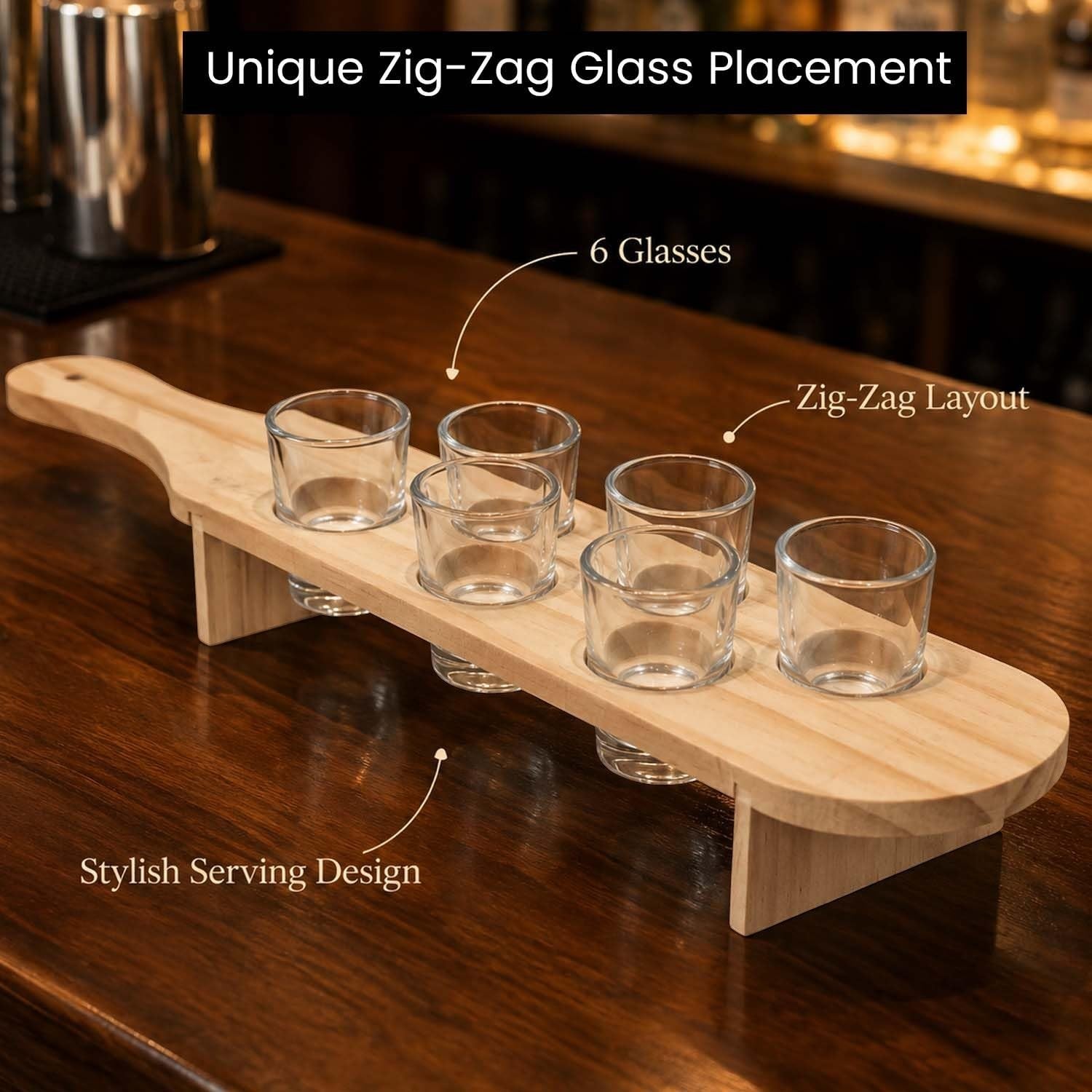 GoHooked wooden shot glass serving paddle with six clear glasses arranged in a stylish zig-zag layout on a table.