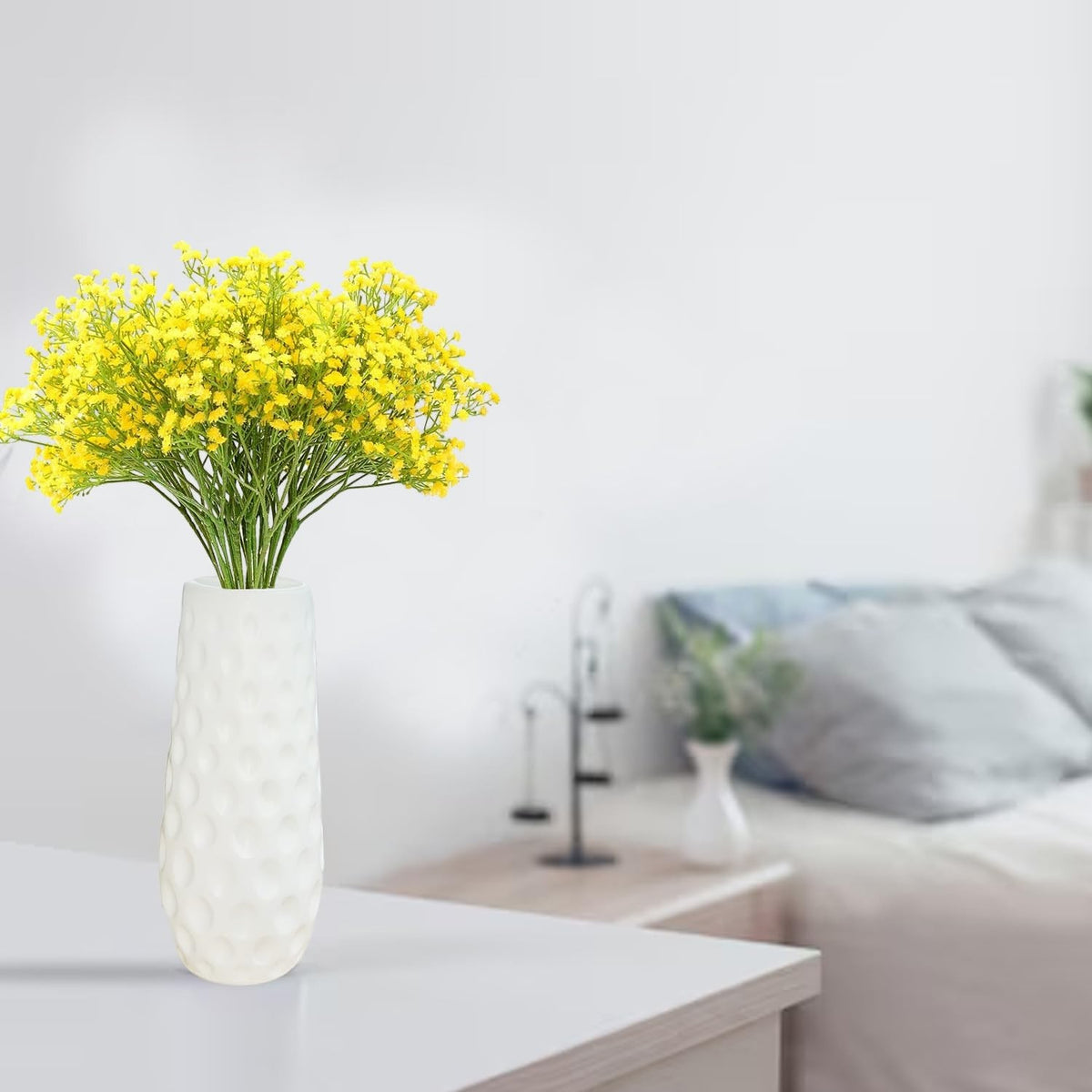 GoHooked yellow artificial baby's breath flowers in a white textured vase. Realistic faux flowers for decor.