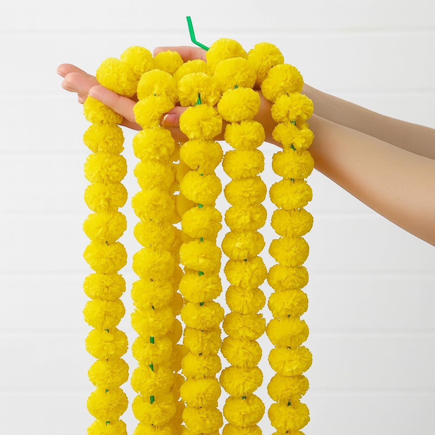 Go Hooked yellow artificial marigold flower garlands, 5 feet long, fluffy texture, perfect for festive decor.