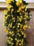 GoHooked yellow artificial rose orchid flower bunch with green leaves, made of silk and plastic, for home decor.