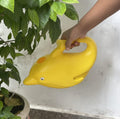 GoHooked yellow dolphin-shaped plastic watering can with 1.5L capacity, ideal for kids and indoor plants.