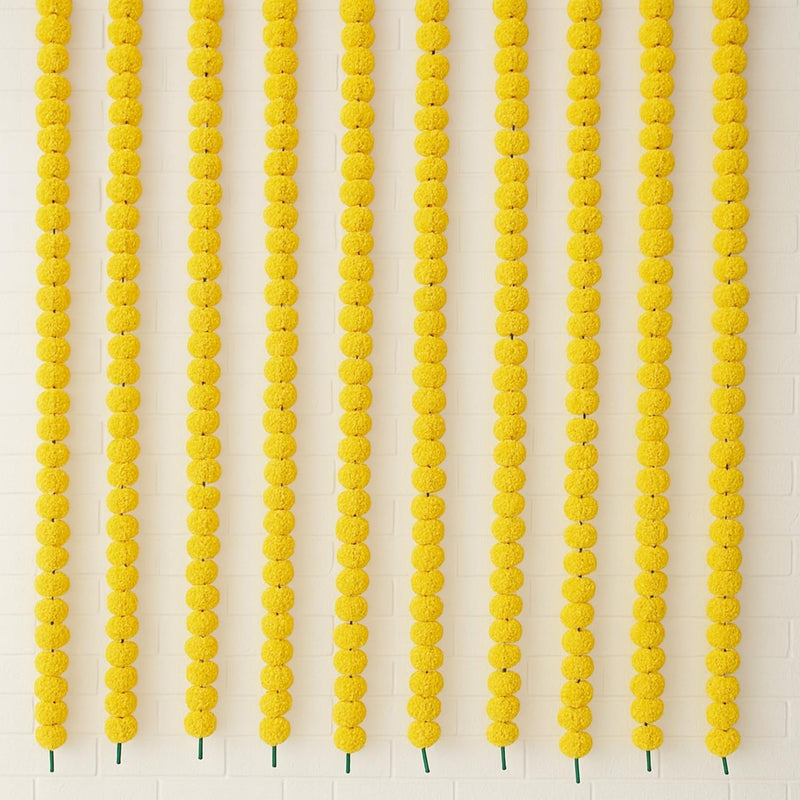 Go Hooked yellow marigold artificial flower garlands, 5 feet long, pack of 10, for festive home and party decor.